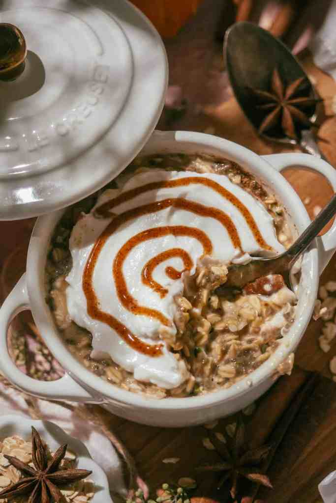 Scooping out the over night oats with a spoon